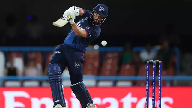 Namibia batter plays an attacking shot during the T20 World Cup warm-up match as Namibia beat Scotland in Bengaluru