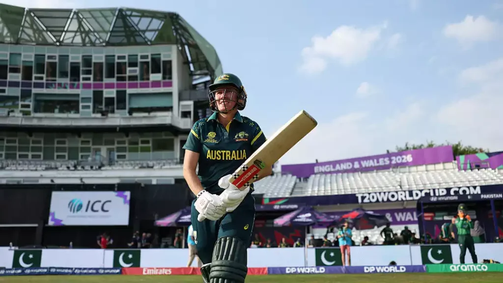 Beth Mooney celebrates after playing a crucial innings for Australia in an international women's cricket match.